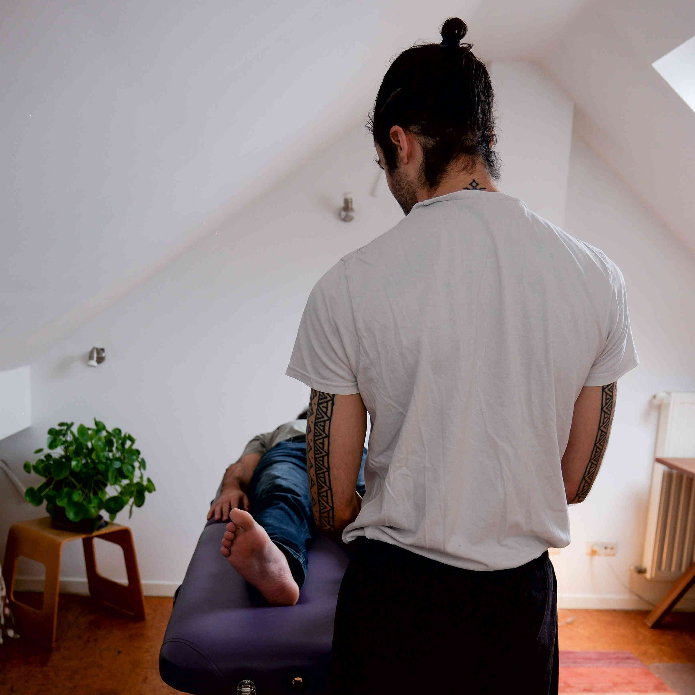 feet massage, view from back